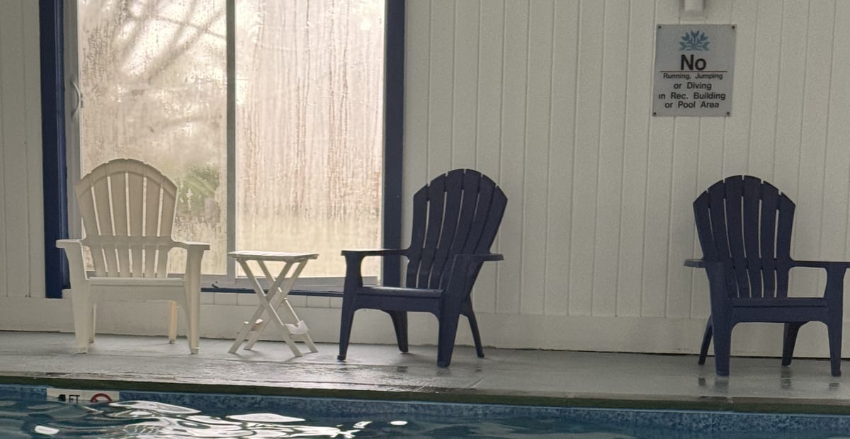 Winterplace heated indoor pool with lounge seating